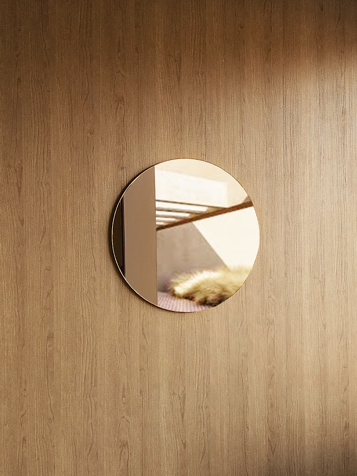 This round wall mirror is a rose gold colour mirror. It is a large round mirror that is photographed in a luxury south african interior design