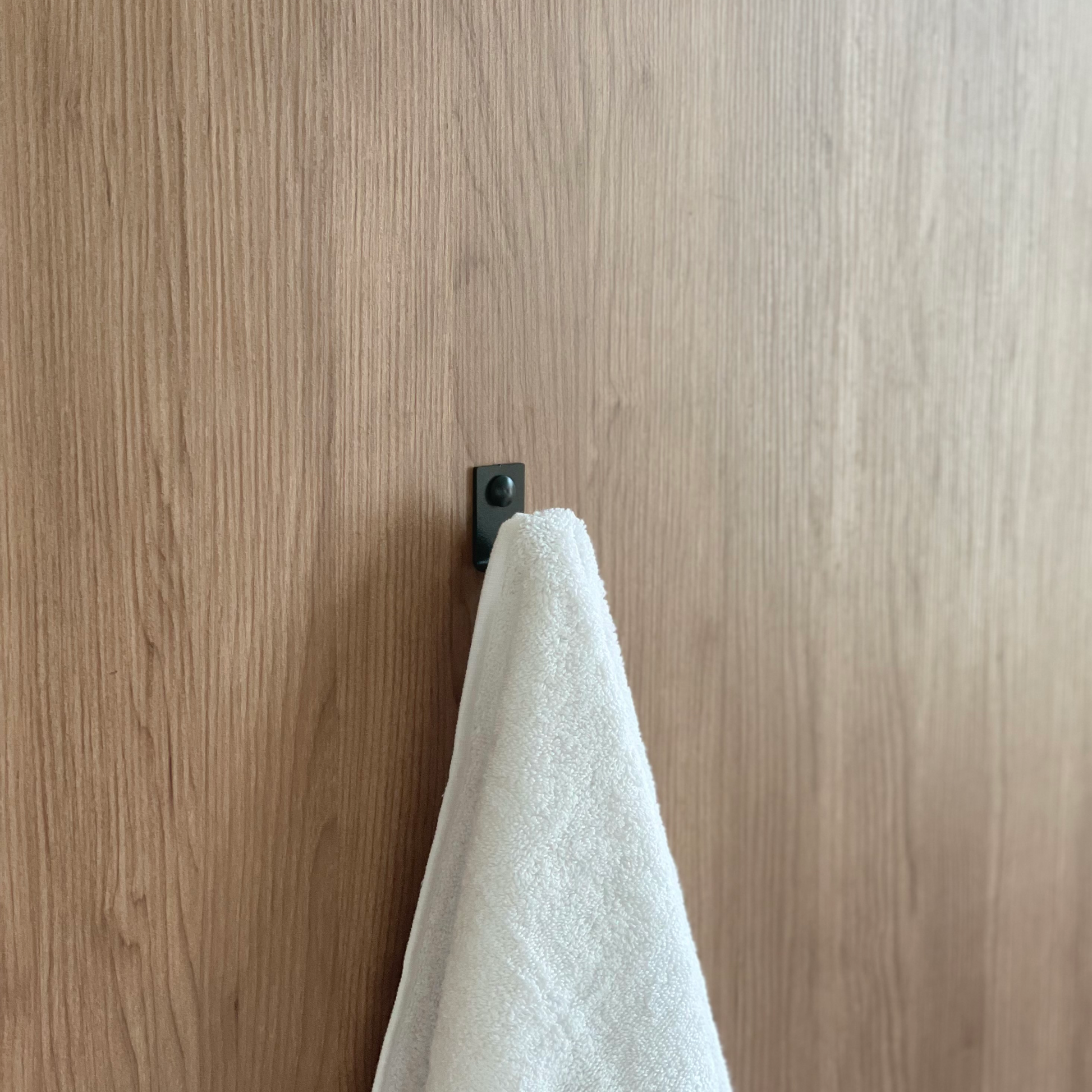 Wall hook towel hook or robe hook with white towel from Mr Price Bathroom