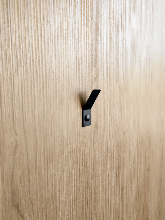 a black wall hook or towel hook in a ctm store in Johannesburg